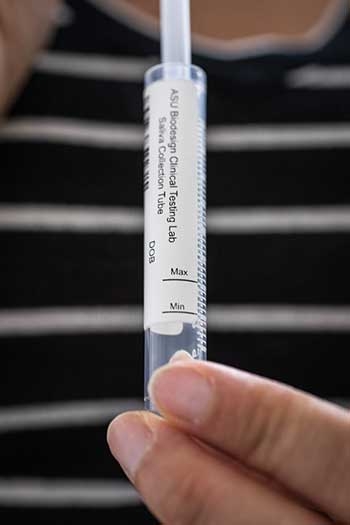 A collection tube for a COVID 19 saliva test