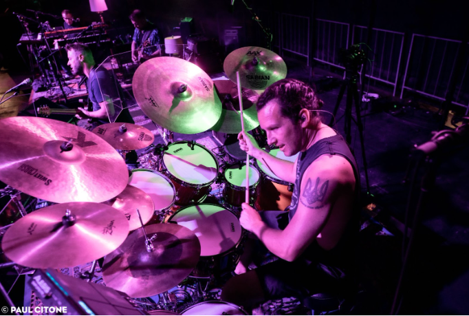 Photo of Nicholas Tkachyk playing the drums