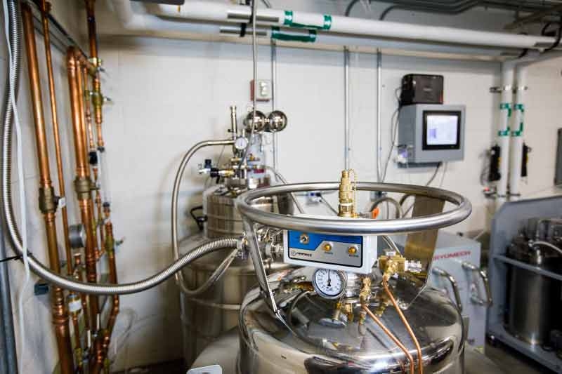 metal tanks and copper pipes form part of the helium recovery system