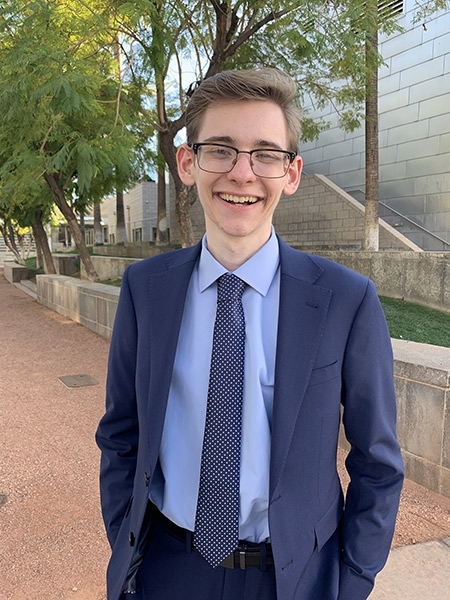 Rhodes Scholar Nathaniel Ross standing in front of ASU building
