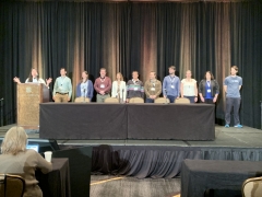Brewer and the other fellows standing on stage at the Exascale Computing Project Annual Meeting.