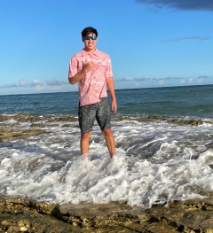 Portrait of student in front of ocean