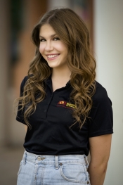A headshot of a woman in an ASU polo shift.