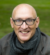 Man with scarf and glasses