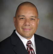 A headshot of Anthony Peguero, joint professor in the Sanford School of Social and Family Dynamics and the School of Criminology and Criminal Justice