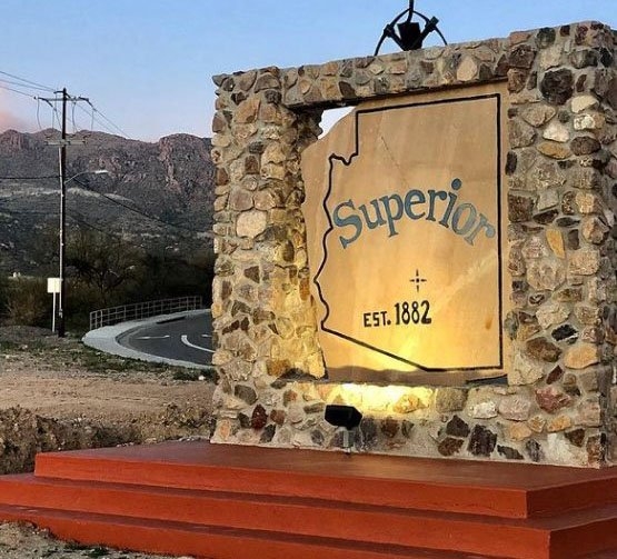 A sign welcomes visitors to Superior, Arizona.