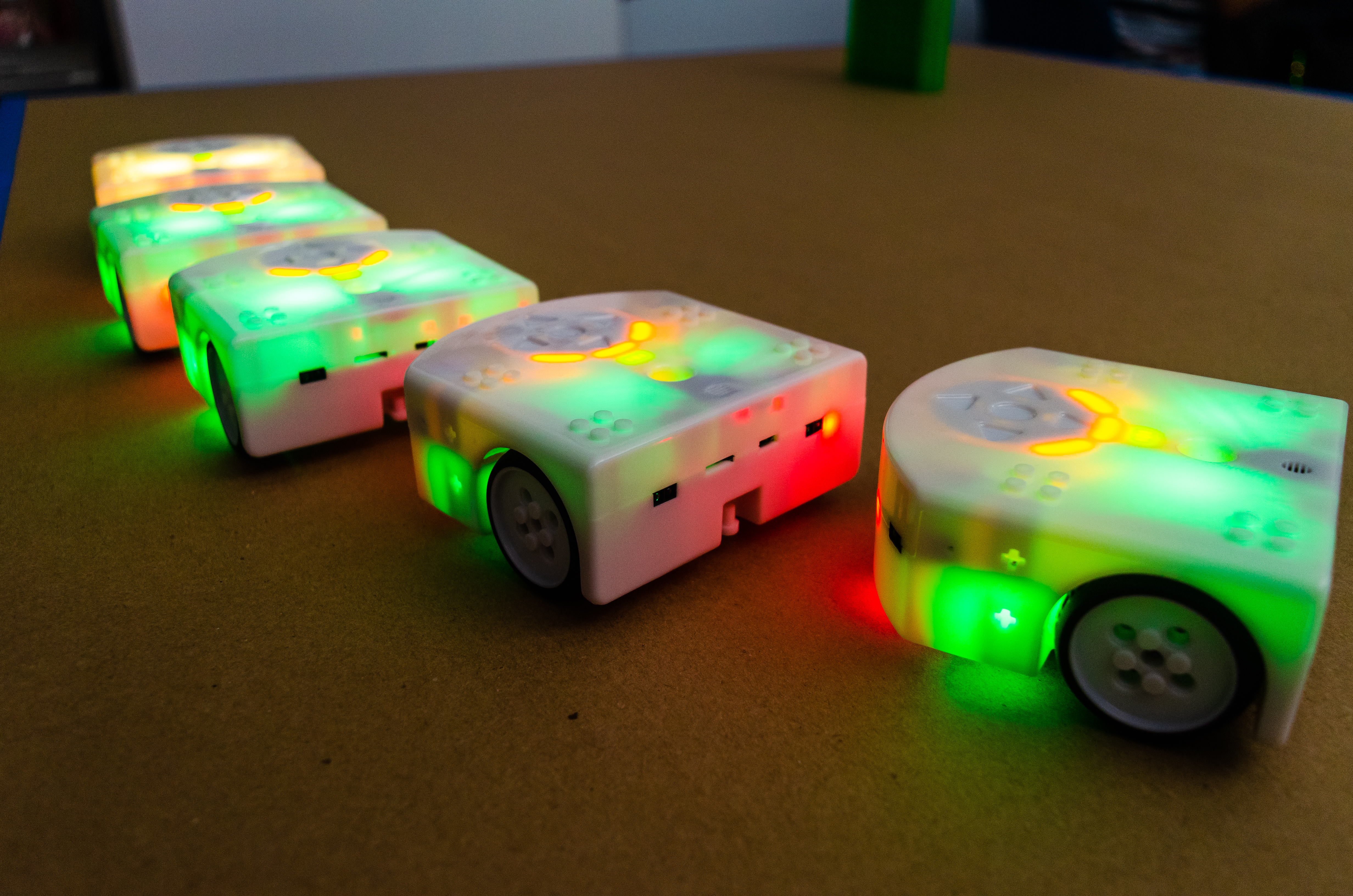 Educational toy robots move together in a convoy