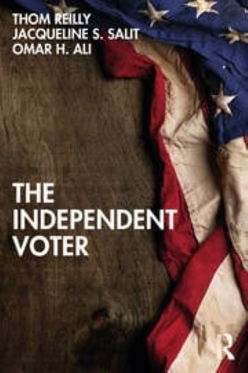 Cover of the book "The Independent Voter" by Thom Reilly, Jacqueline S. Salit and Omar H. Ali, featuring an American flag on a wooden background.