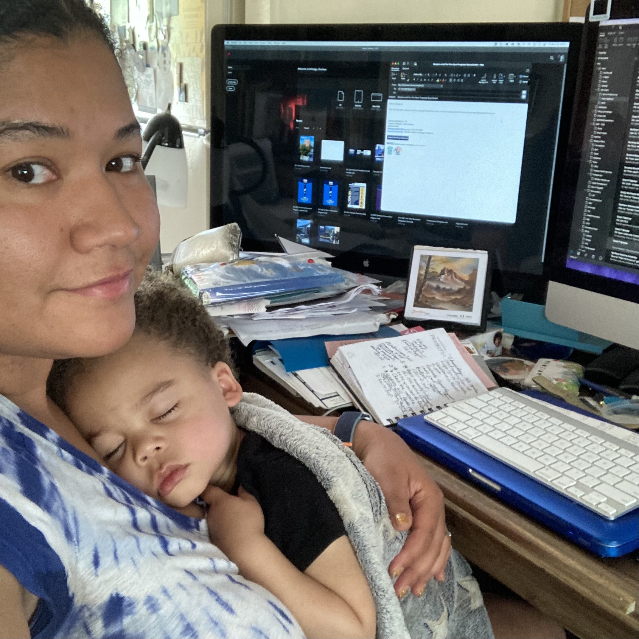 Charlese and her son working from home