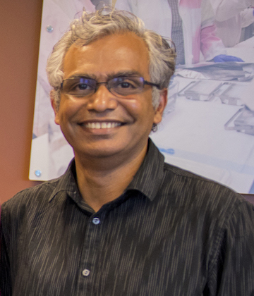 Man in glasses smiling