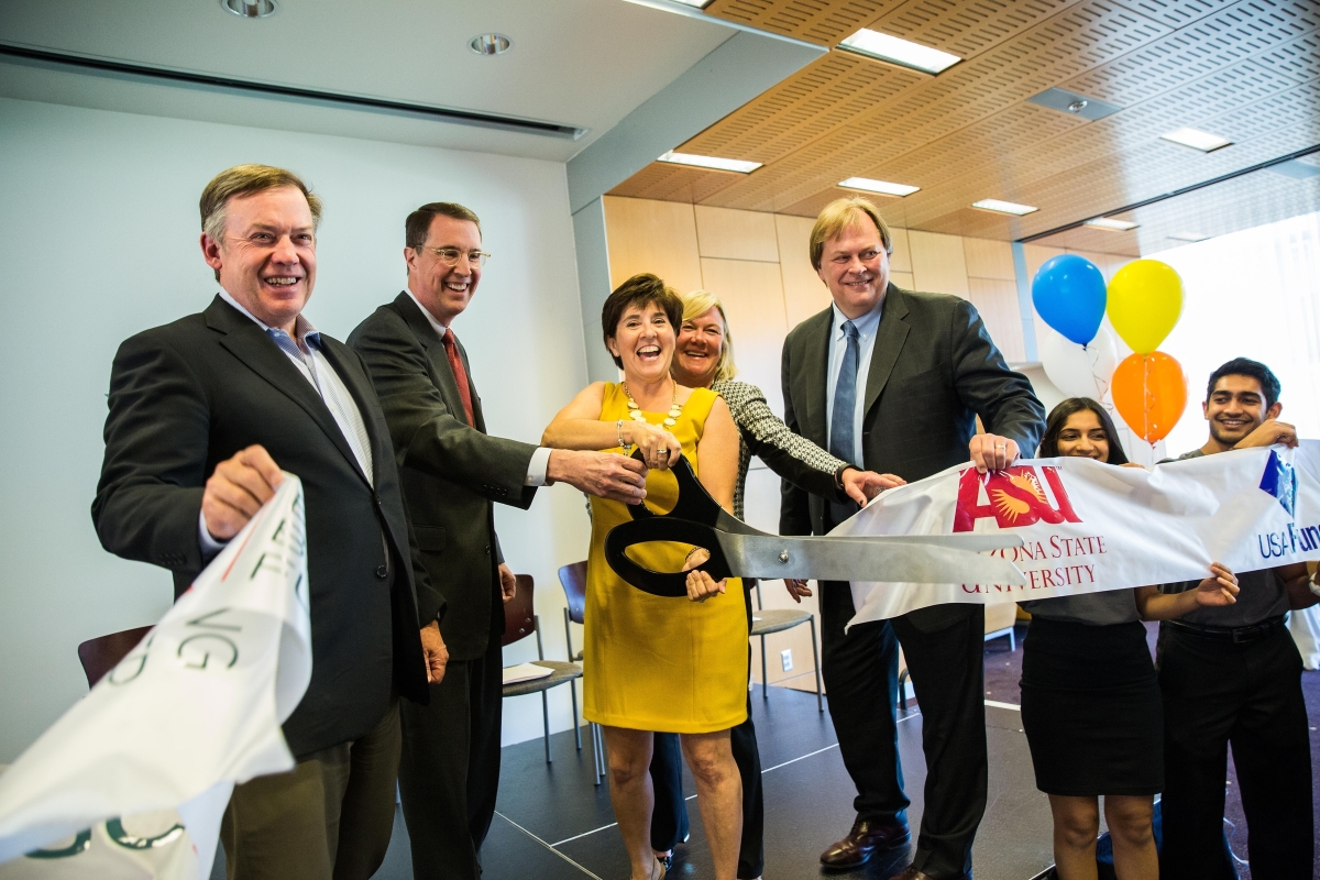 A ribbon-cutting at the PayPal-ASU partnership reception.