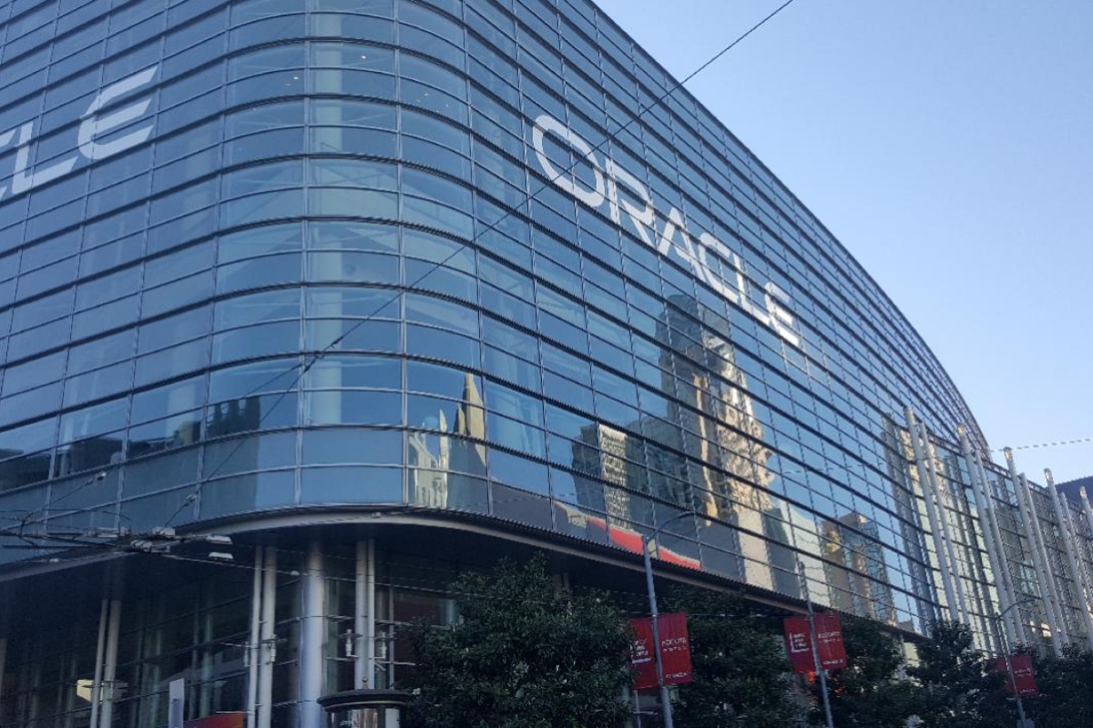 Glass building with a reflection of San Francisco and 