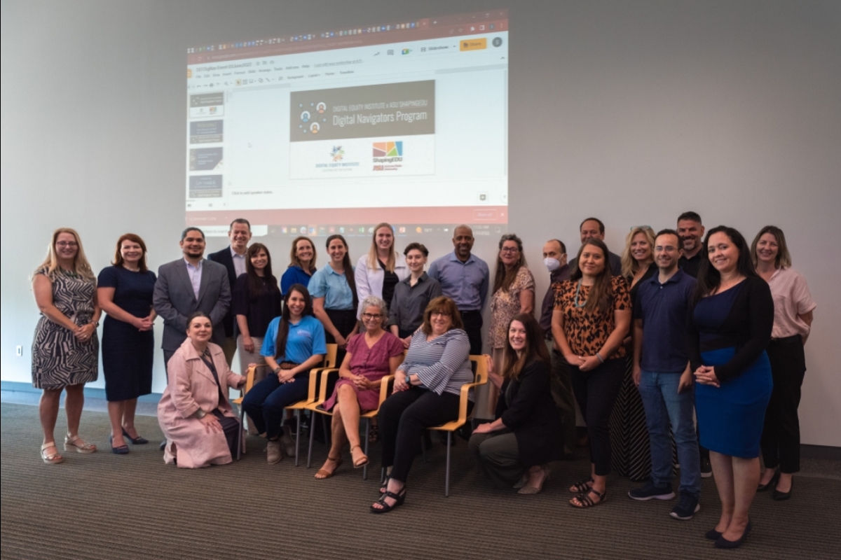 ASU faculty and community members pose for a group picture