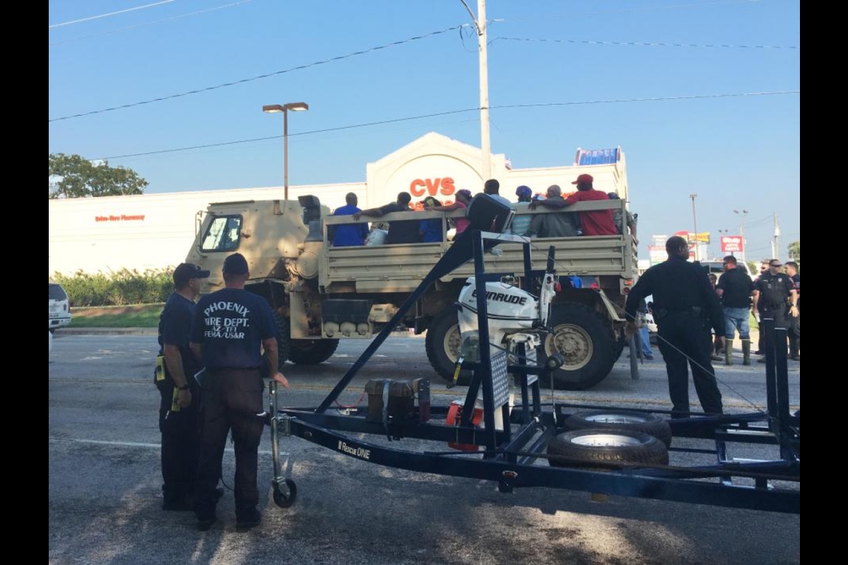 Wharton, Texas Hurricane Harvey victims in National Guard truck