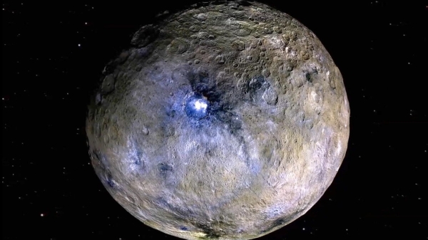 Dwarf planet Ceres is shown in an enhanced-color rendering.